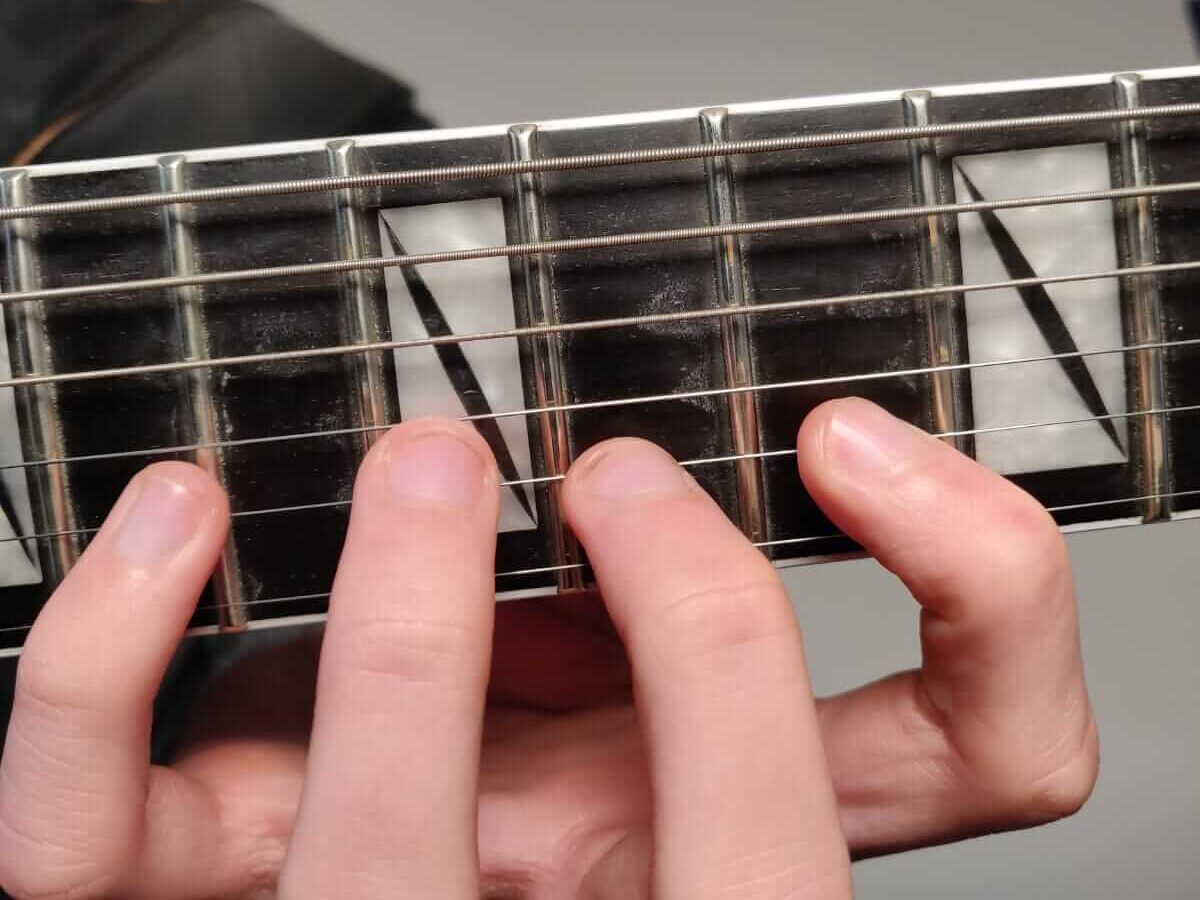 The classical guitar neck grip