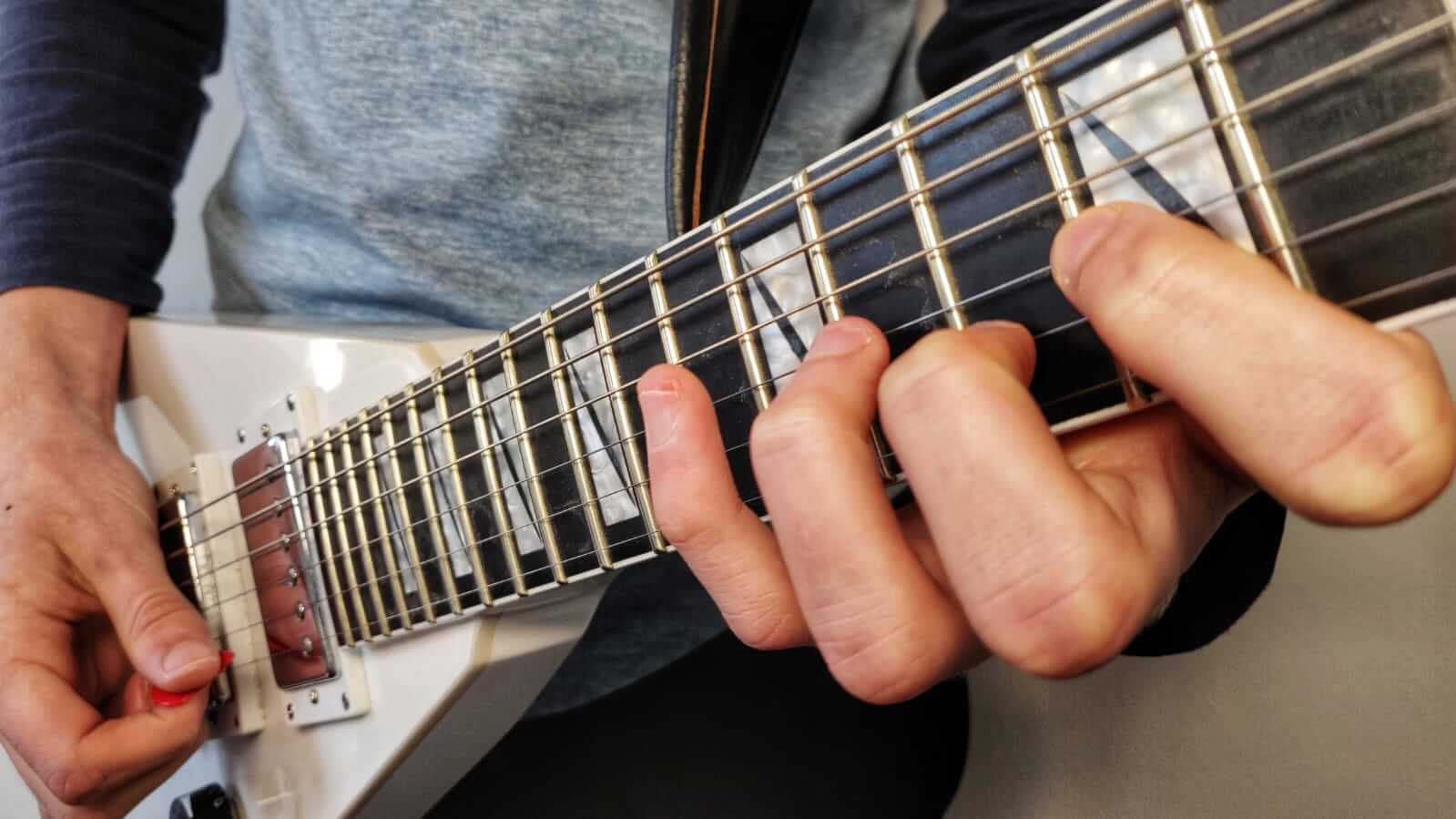You are currently viewing How to Do Sweep Picking Cleanly For Beginners