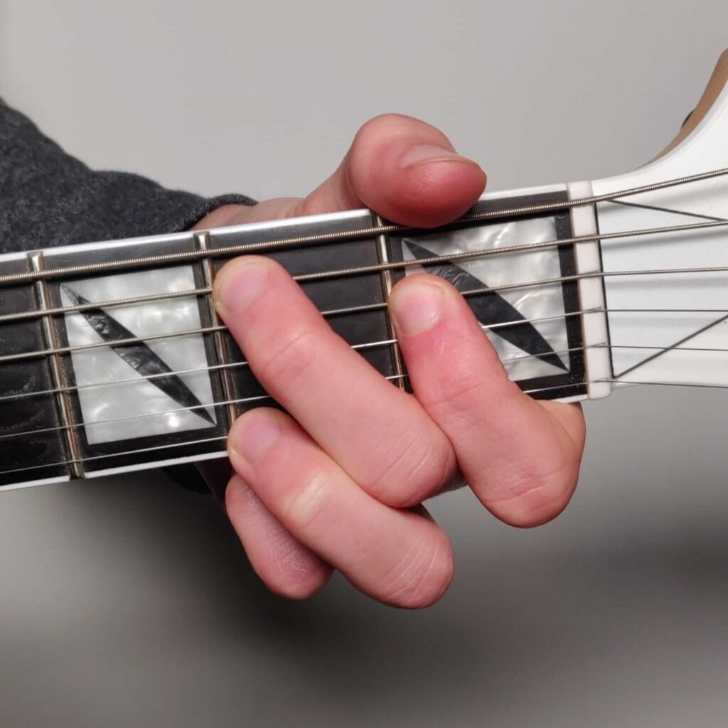 B bar chord - open position fingering