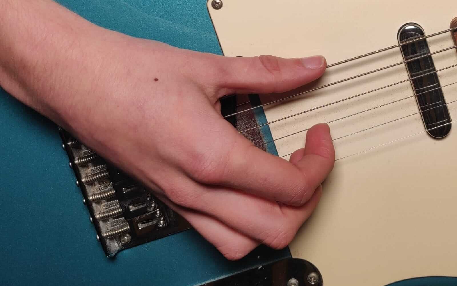 The  Way to Fingerpick on Guitar for Beginners - Beast Mode Guitar